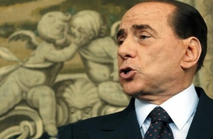 От премьер-министра Италии Берлускони [уходит жена]