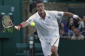 [Сафин завершил последний Уимблдон в карьере] в первом круге