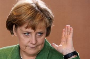 [Меркель не спешит голосовать] на выборах в Германии