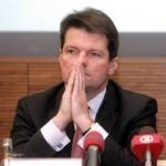 Мелнгайлис: банкам придется объединиться