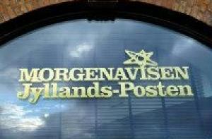 Датская газета спряталась от террористов за колючей проволокой