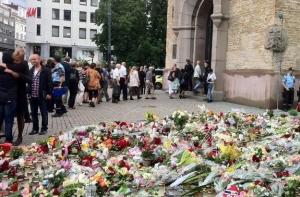 Министры минутой молчания почтили память жертв в Норвегии
