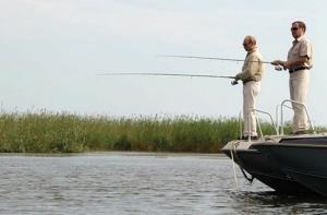 Путин и Медведев покатались на катерах и порыбачили