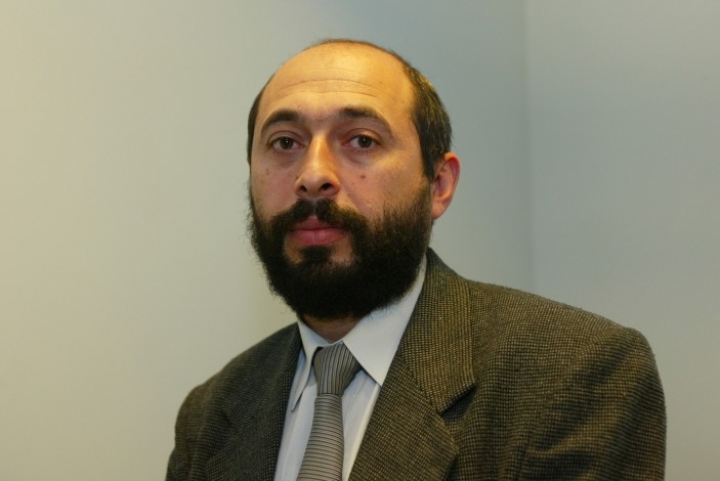 Аналитик: мир решает долговую проблему