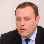 Спруджс работает над сокращением числа депутатов самоуправлений