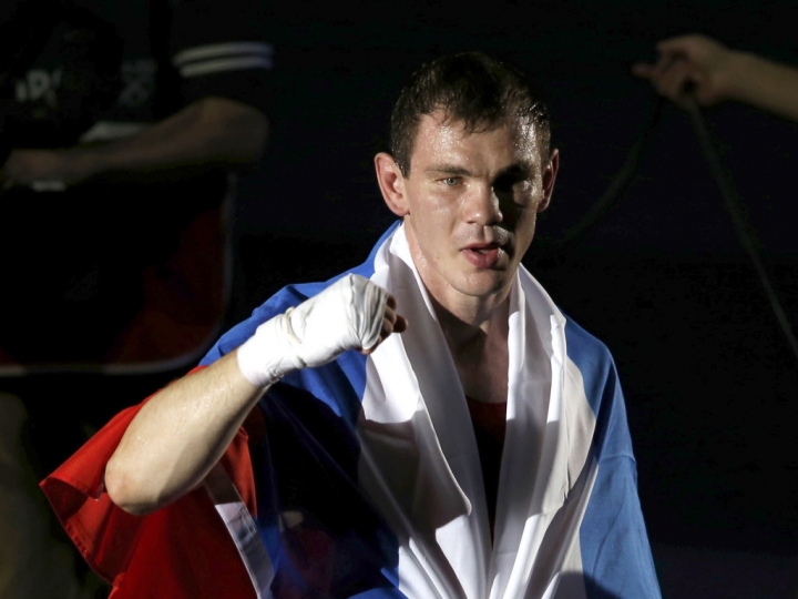 Олимпийскому чемпиону подарили квартиру с долгами