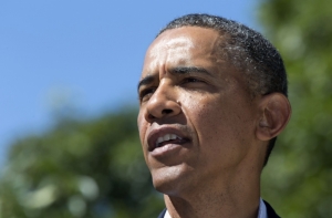 Обама возобновляет работу после отпуска