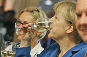 Блок Меркель выиграл выборы в Германии