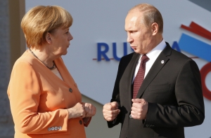 Путин и Меркель поддержали отправку миссии ОБСЕ на Украину