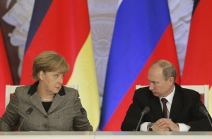 Путин и Меркель договорились о встрече в Нормандии