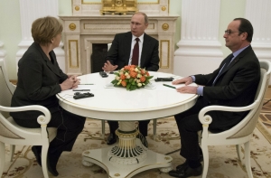 Переговоры Путина, Олланда и Меркель продолжаются более четырех часов