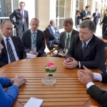 Путин призвал Меркель и Олланда повлиять на Киев в Варшаве