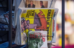 Charlie Hebdo выпустил карикатуру с Асадом на тему химической атаки