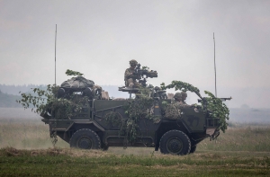 Военные учения впредь будут проводить и за пределами Адажской базы