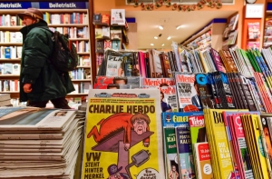 Charlie Hebdo получил угрозы после карикатуры на исламского ученого