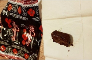 Опять иголки? Жительница обнаружила в конфетах кусок железа